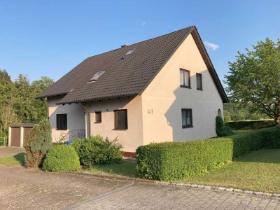 Geräumiges 2-Familienhaus (7 Zimmer) in Rauhenebrach mit wundervoller Ortsrandlage