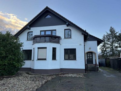 Wunderschöne Dachgeschosswohnung mit Garten und Pool