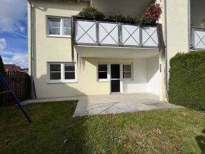 Gemütliche Erdgeschosswohnung mit Garten, Garage und Carport