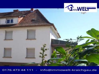 Charmante Doppelhaushälfte mit üppigem Garten und Garage