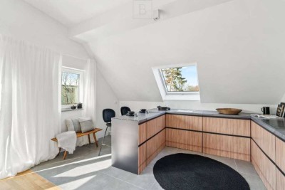 Erstbezug: 3 Zimmer Dachgeschosswohnung mit attraktivem Balkon nach Westen