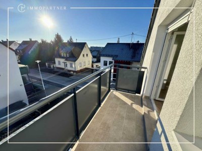 Moderne 3-Zimmer-Wohnung mit Balkon, Einbauküche, Stellplatz und ca. 50 m² ausgebautem Dachboden