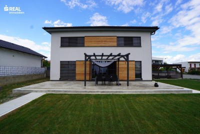 Modernes Traumhaus mit Carport und südseitigem Garten