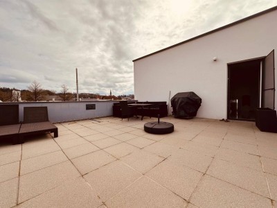 Attraktive Wohnung mit Garten und sonniger Dachterrasse
