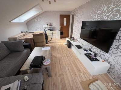 Charmante 4 Zimmer-DG-Wohnung für Paare oder Familien, die das Wohnen unter dem Dach schätzen!