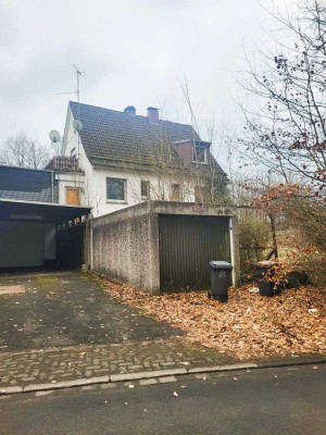 ZWANGSVERSTEIGERUNG: DHH mit Garage in Siegen- Geisweid