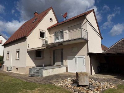 Stilvolles Einfamilienhaus mit Garten, Balkon und vielseitigen Wohnmöglichkeiten in Herxheim
