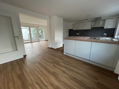 Attraktive 3-Zimmer-EG-Wohnung mit Terrasse & Gartenanteil