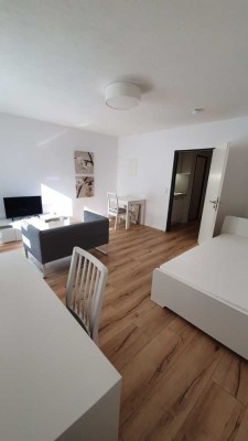 Kurzzeitvermietung - Exklusive 1-Zimmer-Erdgeschosswohnung mit Einbauküche in Ulm