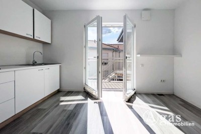 Barrierefrei!: Freundliches 1-Zimmer-Appartement mit Balkon, Küchenzeile + Gemeinschaftsraum im Haus