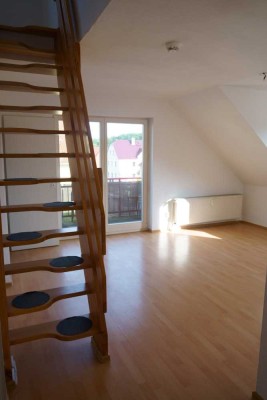 Verspielte Maisonette-Wohnung mit 2,5 Zimmern und moderner Einbauküche