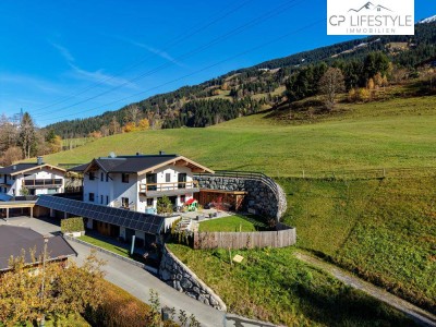Hochwertige Wohnung mit kleinem Garten und Doppelgarage in Jochberg