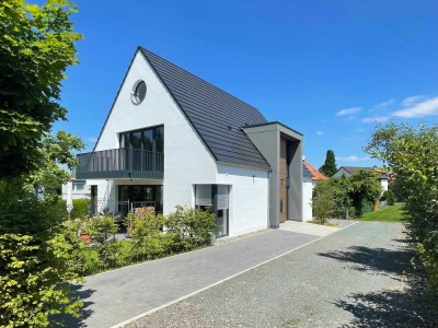 Sonnige Neubauwohnung mit eigenem Garten in Korbacher Bestlage
