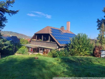 Vielseitig nutzbares Zweifamilienhaus in Feldrandlage mit toller Aussicht und großem Garten