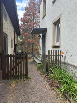 Erdgeschosswohnung mit Garten & Garage und Kaminanschluss