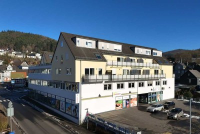 Gemütliche Zweizimmerwohnung mit Balkon und Tiefgaragenstellplatz in zentraler Lage