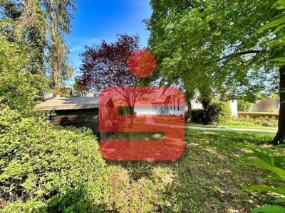 Winkelbungalow mit Garten, Terrasse und Garage in attraktiver Lage!