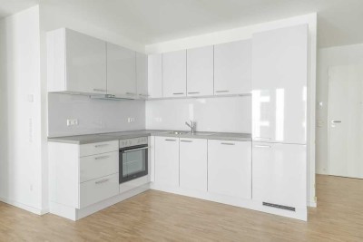 Exklusive Etagenwohnung mit lichtdurchfluteten Räumen, stilvoller Einbauküche und sonnigem Balkon