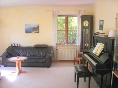 Erdgeschosswohnung mit Garten im Zweifamilienhaus