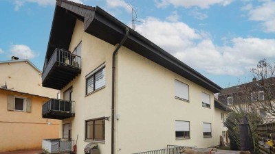 Zwei Immobilien zu einem Preis - Reihenendhaus mit angebautem Dreifamilienhaus!