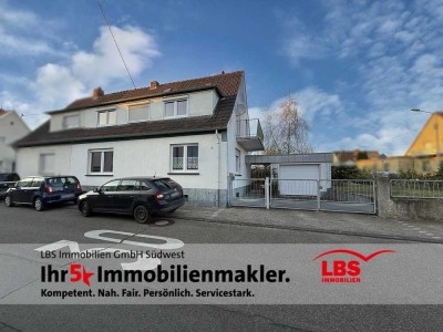 Charmantes Einfamilienhaus mit Garage und gepflegtem Garten