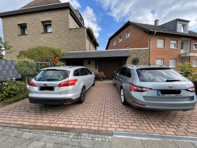 Großzügiges Haus mit Einliegerwohnung, Garten, Hof & Balkon