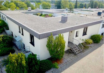 Winkel-Bungalow mit Einliegerwohnung in Neureut-Kirchfeld