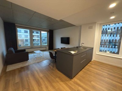 Großzügige 2-Zimmerwohnung mit offenem Wohnkonzept, Kochinsel & begehbarem Kleiderschrank