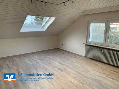 Traumhafte Dachgeschosswohnung mit Loggia