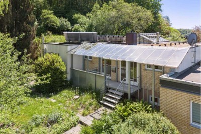 Rohdiamant in Dettingen/Konstanz: Modernisierter Bungalow in exponierter Waldrandlage