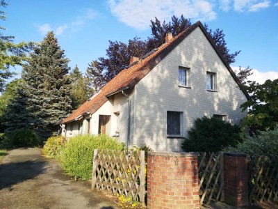 Einfamilienhaus in idyllischem Garten zu verkaufen