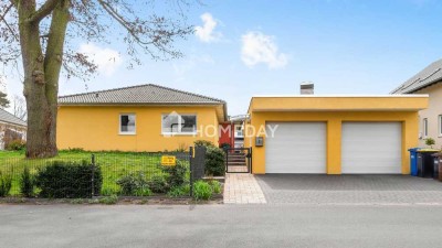 Top gepflegter Bungalow mit Doppelgarage, großem Grundstück, EBK und Extras in idyllischer Lage