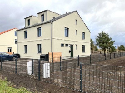 Wohnung mit Garten und 2 Stellplätzen inkl. für NKM 12,55 €/m²