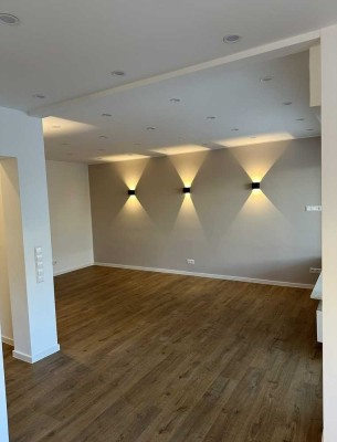 Exklusive Wohnung mit Gartenanteil und Garage - sofort verlieben! Top Lage!