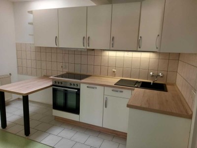 Geräumige 1-Zimmerwohnung  mit toller Einbauküche am Marktplatz! Barrierefrei.