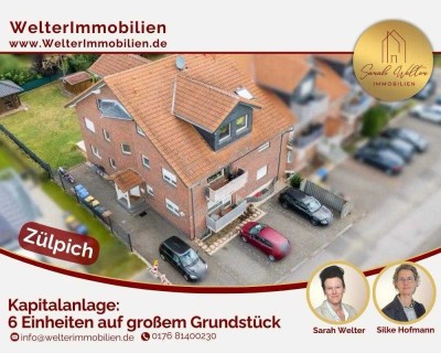 Solide Kapitalanlage mit sechs Einheiten inklusive Stellplätzen auf großem Grundstück