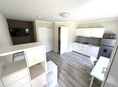 möblierte Einraumwohnung mit Terrasse im wunderschönen Wohnpark