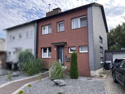 Familienfreundliche Doppelhaushälfte in Sonnenlage mit modernster Ausstattung und großem Garten!