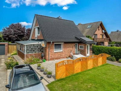 Modernisiertes Einfamilienhaus mit großem Garten.