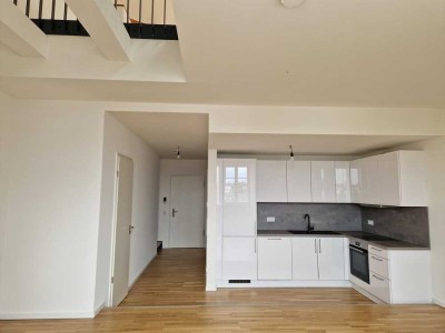 Zentrumsnahe Galeriewohnung mit Einbauküche und Tiefgarage