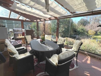 Wohnoase mit Wintergärten, Garage & traumhaftem Garten und Baugrundstück in Bremerhaven