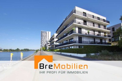 Wohnen direkt an der Weser! Moderne 3-Zimmerwohnung mit Garten und Tiefgaragenstellplatz