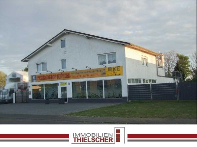 Vielseitige Gewerbeimmobilie mit Betriebswohnung, Werkstatt und Erweiterungspotential