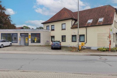 Saniersbedürftiges 12 Zimmer-Einfamilienhaus mit anliegender Gewerbeeinheit
