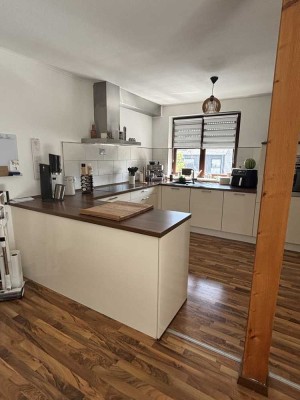 Charmante Etagenwohnung mit Dachterrasse in ruhiger Lage