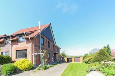 Umfassend modernisiert: Teilvermietetes Zweifamilienhaus mit traumhaftem Grundstück in Heßlingen