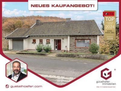 Handwerklich begabt? Einfamilienhaus mit Einliegerwohnung am Bachlauf, Garten, Garage und Potenzial