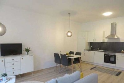 Exklusive, vollständig renovierte 1-Raum-Wohnung mit Balkon und Einbauküche in Appenweier
