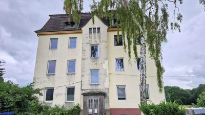 6-Familienhaus als entwicklungsfähige Kapitalanlage auf großem Grundstück!