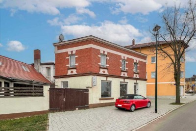 Gepflegtes 5-Zi.-Haus mit Garten und Gewerbeeinheit zur flexiblen Nutzung